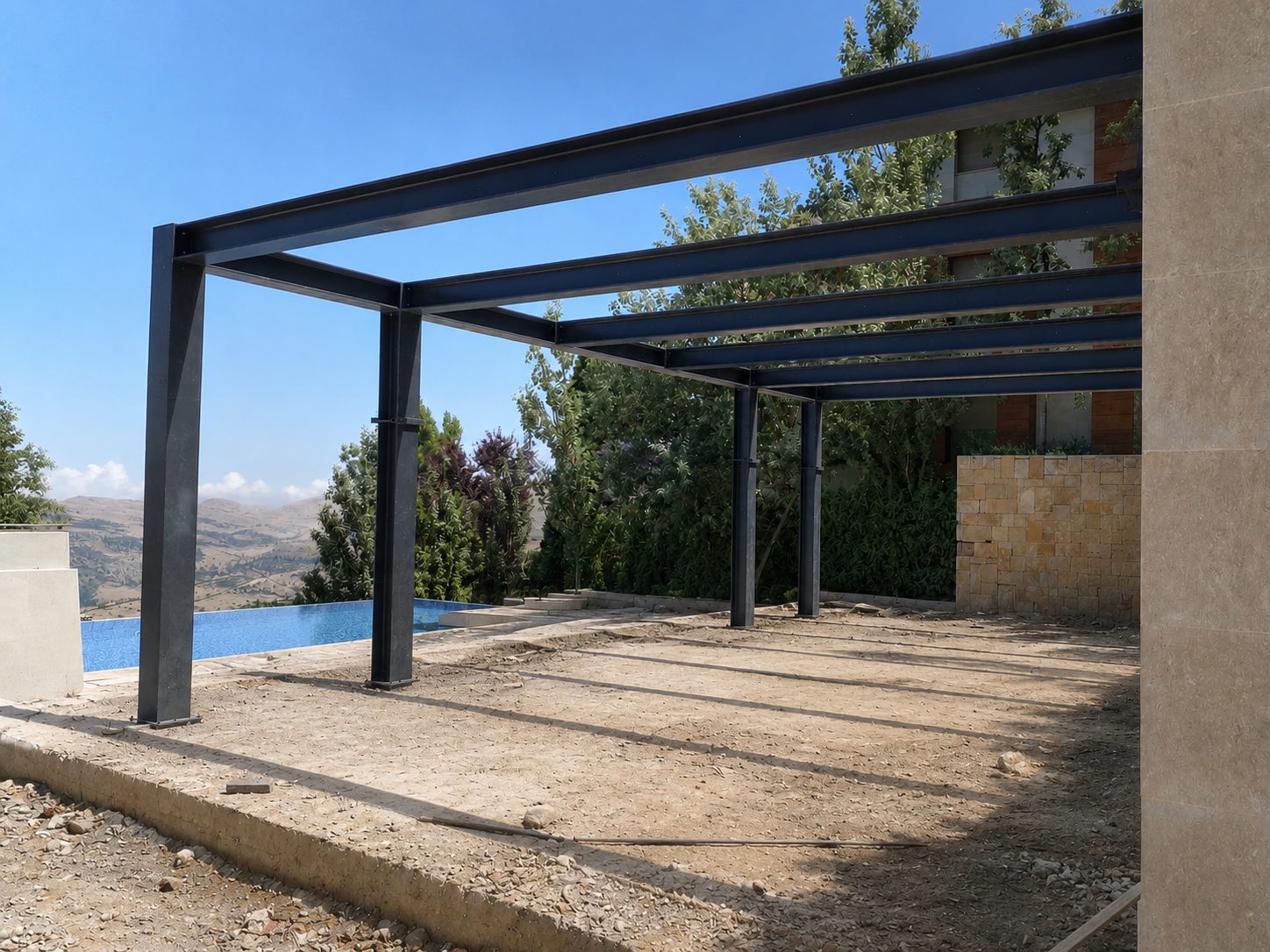 Steel pergola frame beside an infinity pool